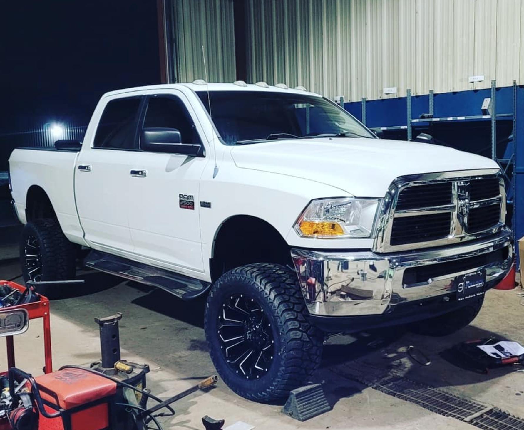 white pick-up truck getting PA state inspection at Taylor's Springs, Brake & Alignment